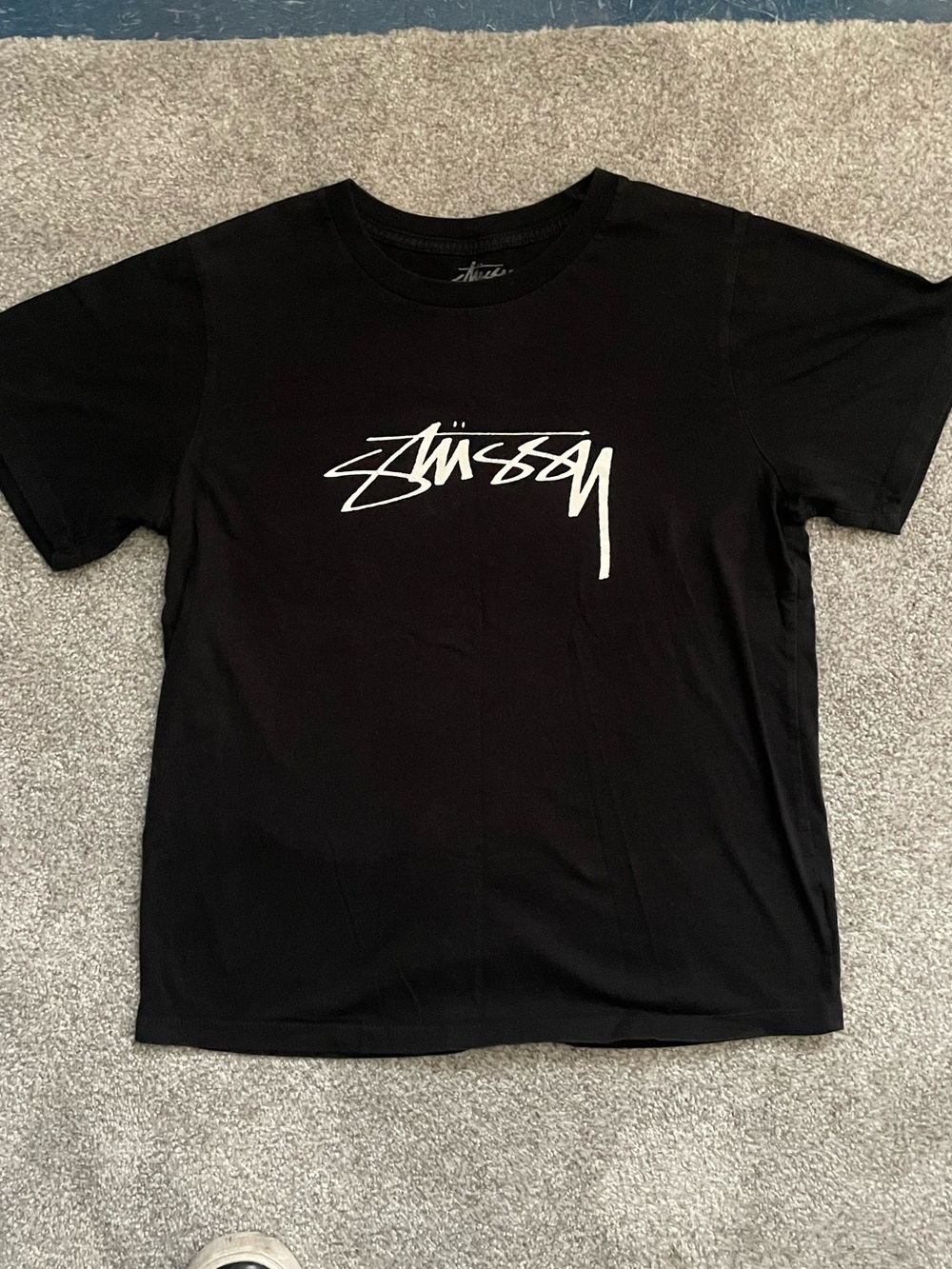 Stussy Black T-Shirt with White Script Logo